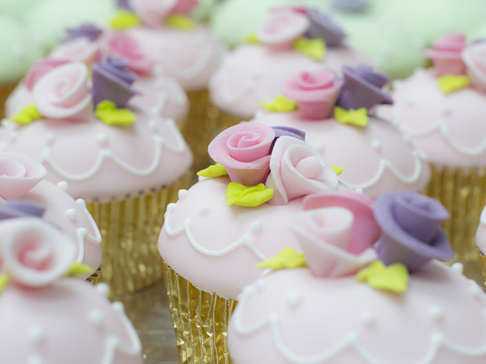 Rose and glitter wedding cupcakes